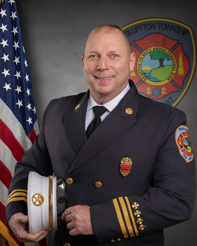 Portrait of Battalion Chief Vernon Edenfield of the Bluffton Township Fire District in uniform.