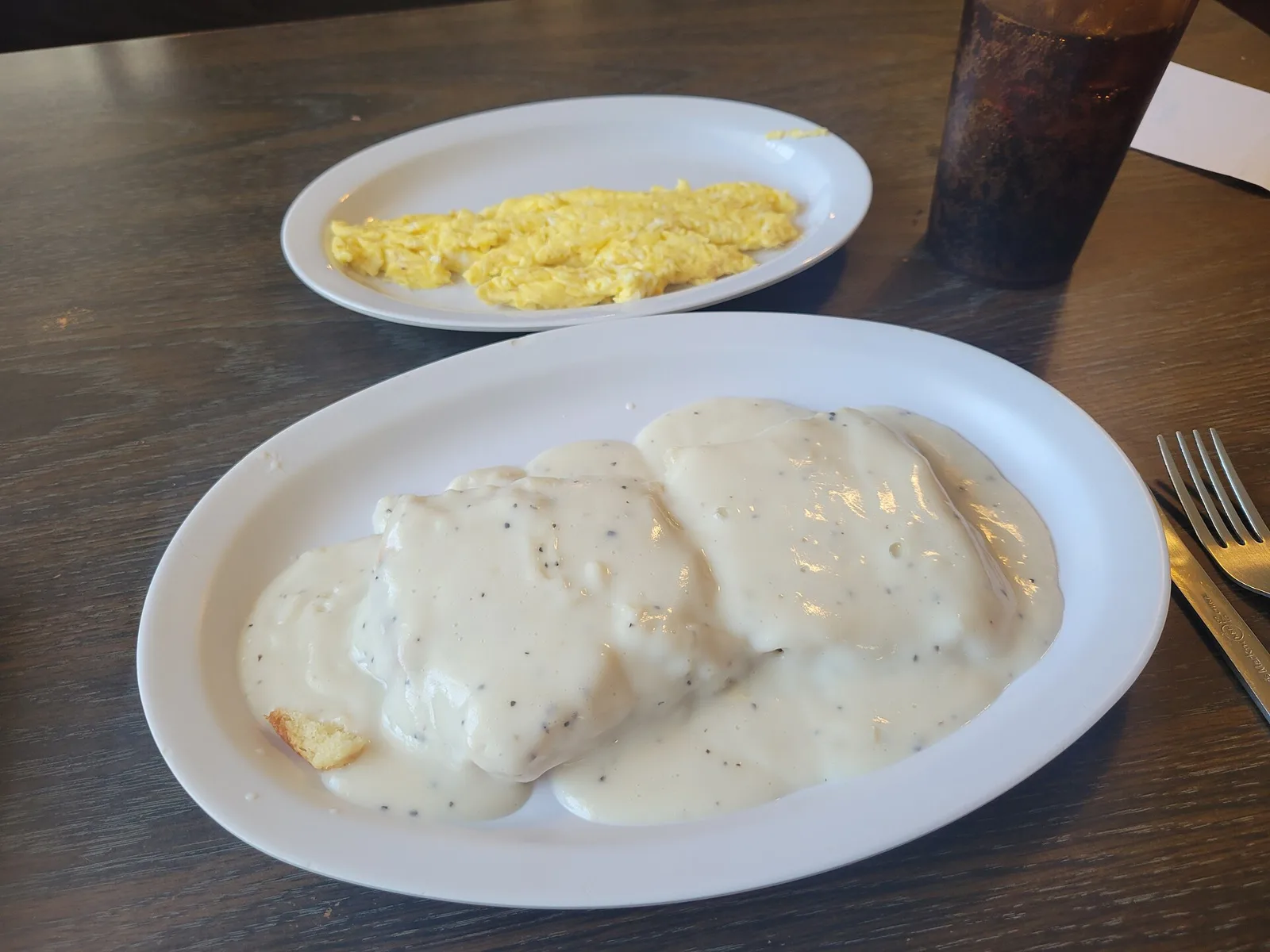 Biscuits and gravy with a side of scrambled eggs at a cafe in Marietta, Ga. The photo was not taken in Bluffton.