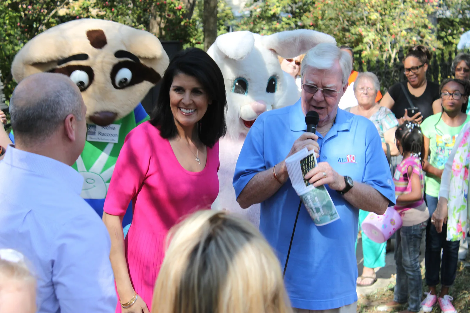The Easter Bunny and a costumed mascot greet families at the annual Easter egg hunt at the South Carolina Governor's Mansion in Columbia.