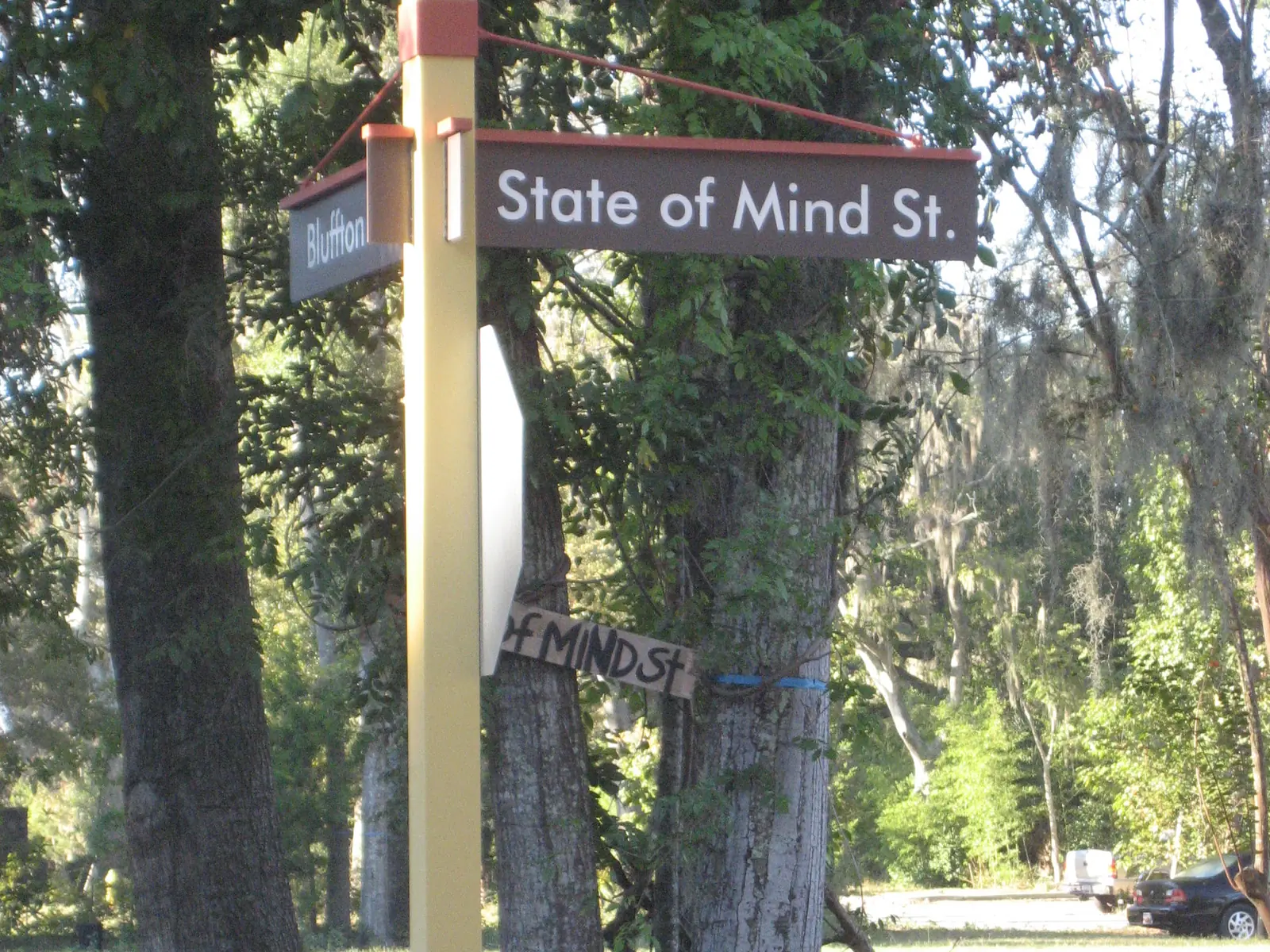 A street sign marks State of Mind Street at the Promenade in Old Town Bluffton, where several bars and restaurants sit.