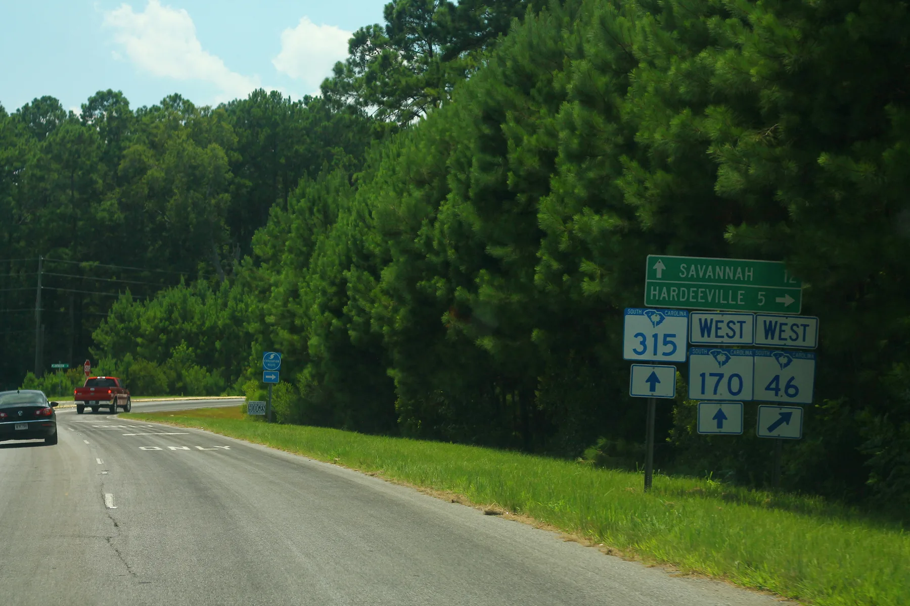 Route signs for S.C. 170 and S.C. 46 west on Okatie Highway, near New Riverside on Bluffton's western edge.