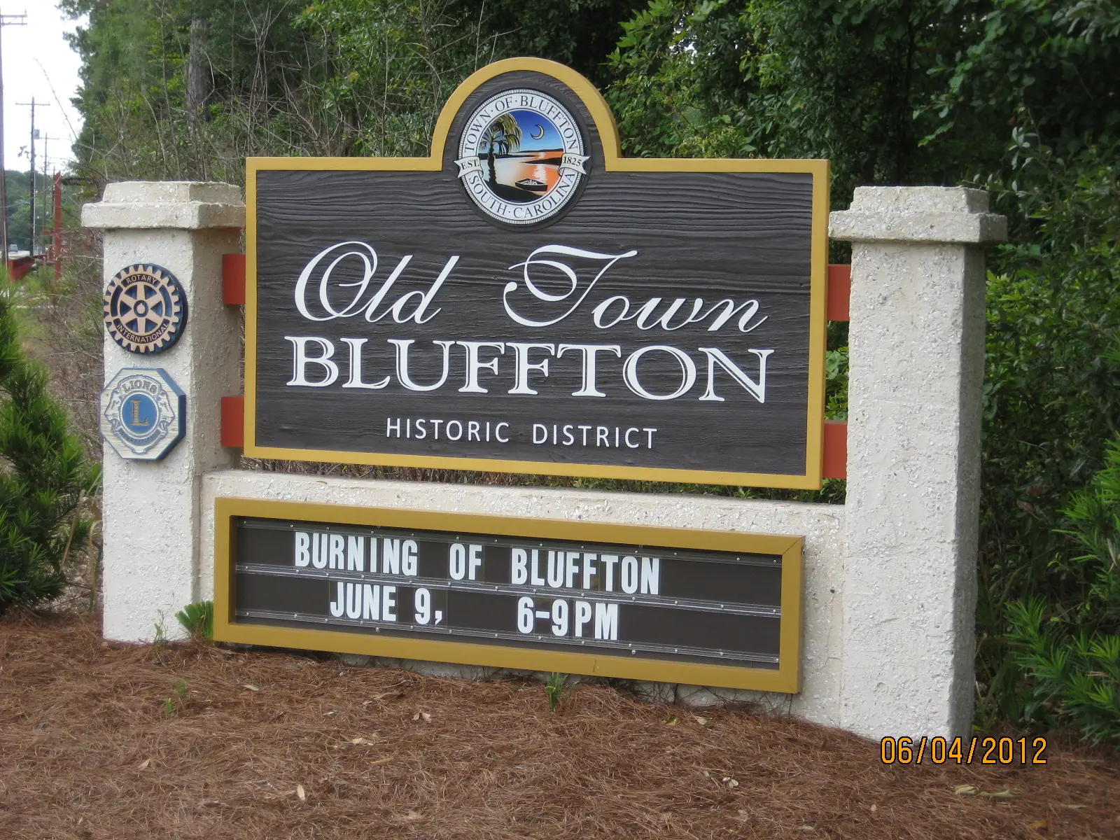 The Old Town Bluffton Historic District sign at the southeast entrance to Old Town.